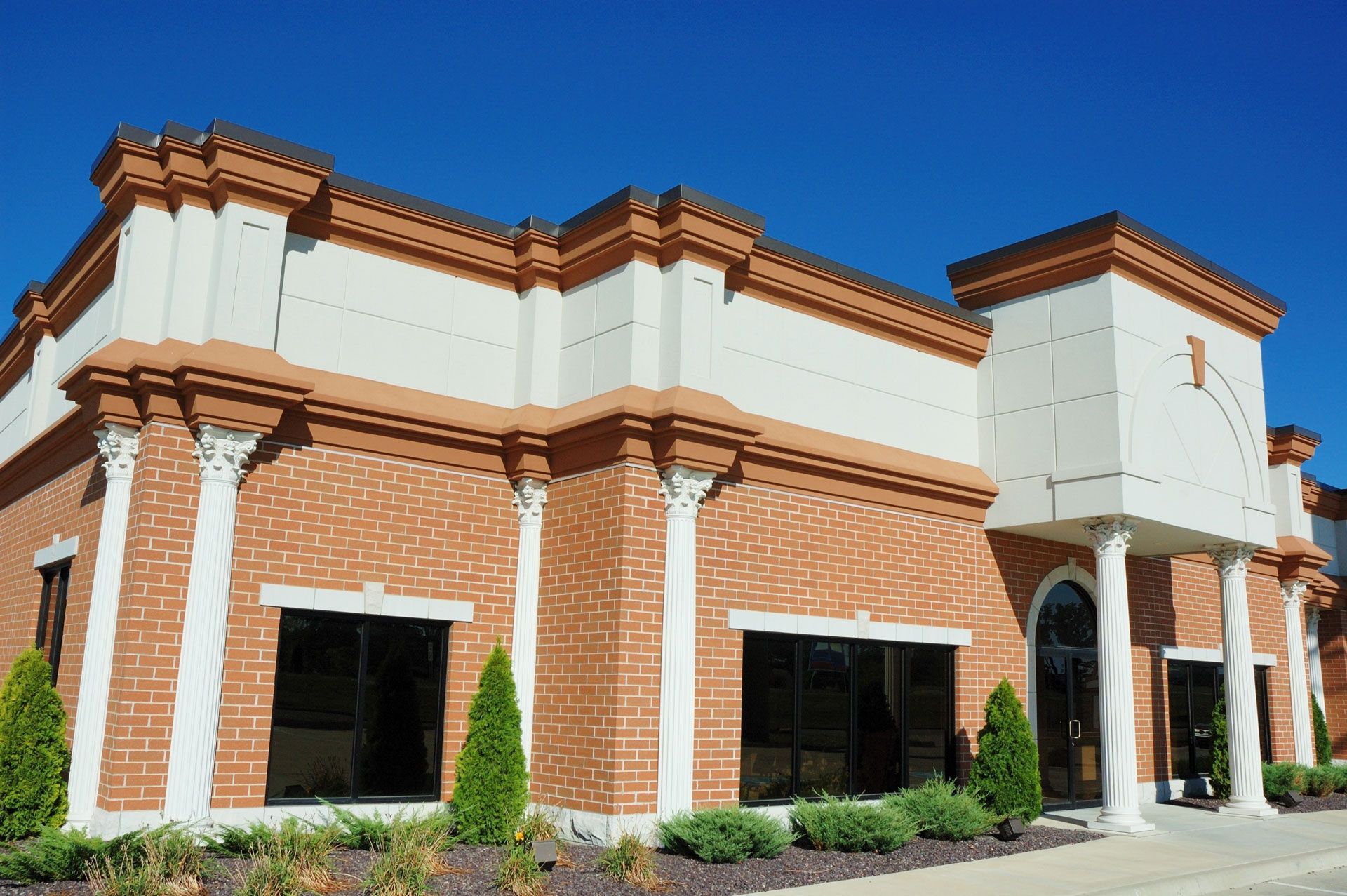 A brick building with the number 1 on the top of it