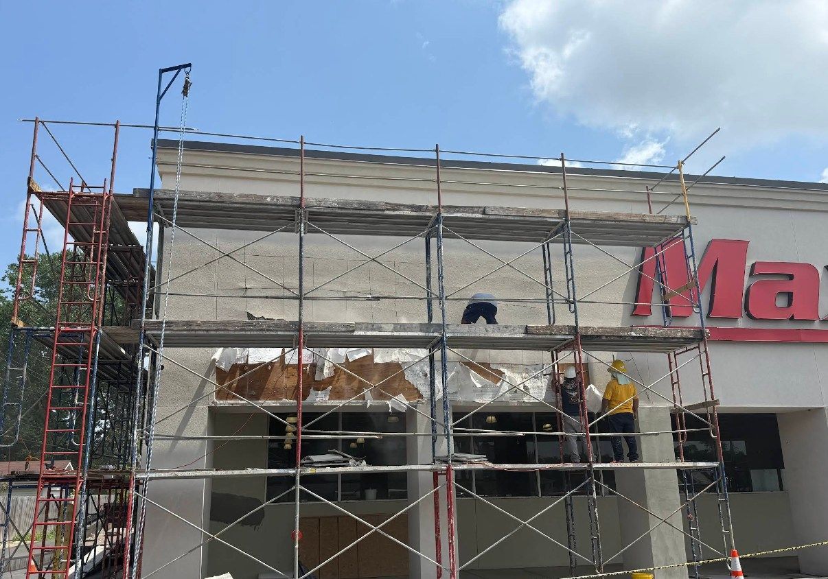 A building that is being remodeled with scaffolding around it.