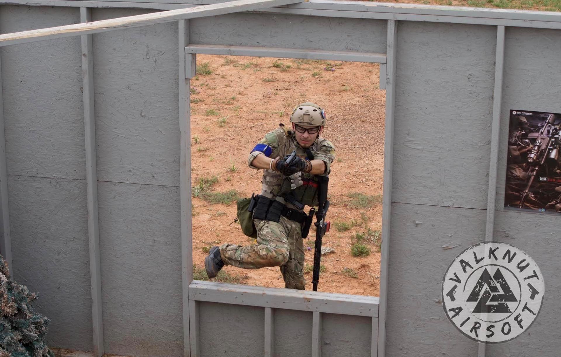 Airsoft Player Aiming at the Window