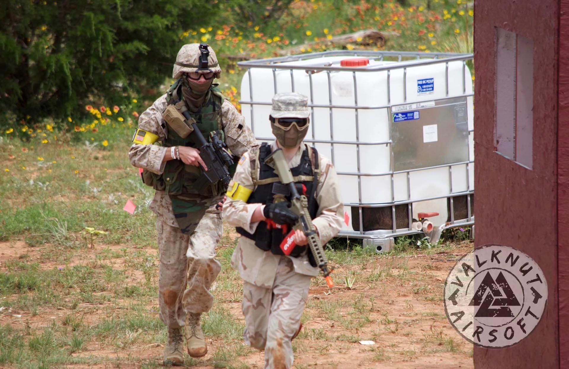 Two Airsoft Players With Rifle