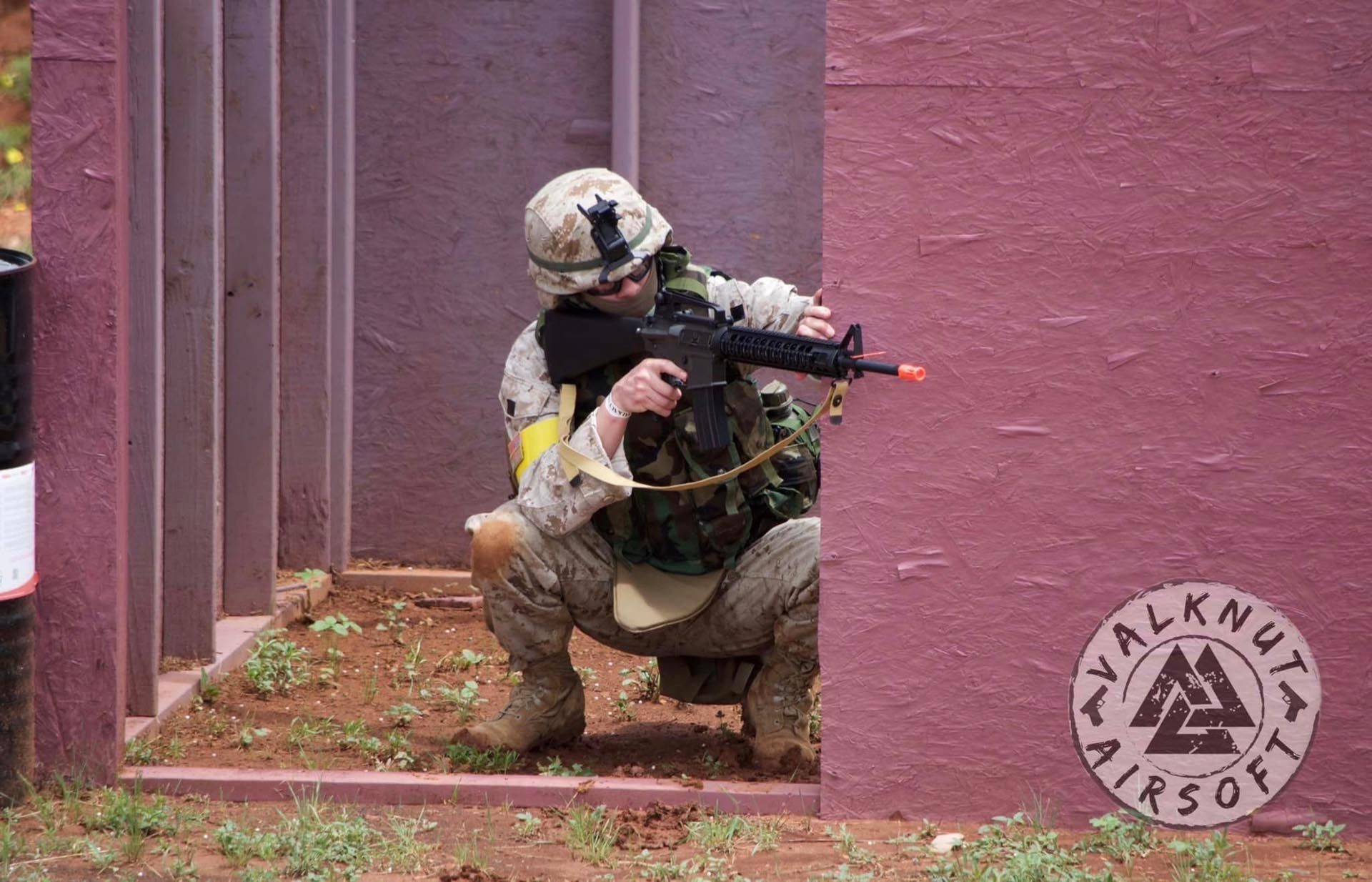 Crouching airsoft player