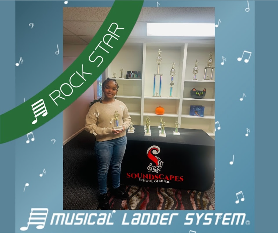 Lauren earned her certificate, wristband, and trophy for 1 year!