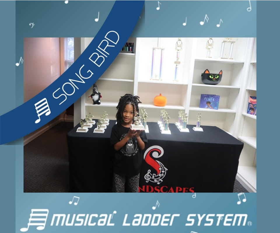 Sami earned her certificate, wristband, and trophy for 6 months!