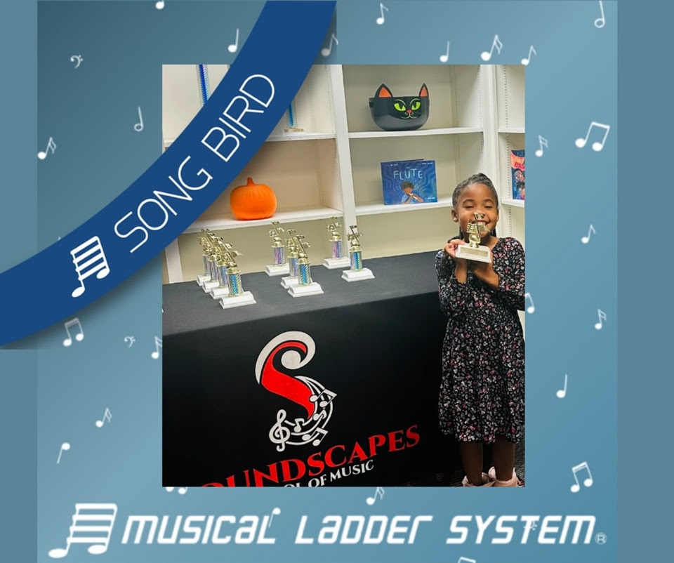 Chloe earned her certificate, wristband, and trophy for 6 months!