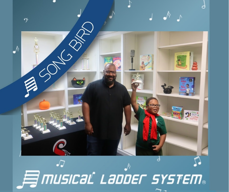 Robert earned his certificate, wristband, and trophy for 6 months!