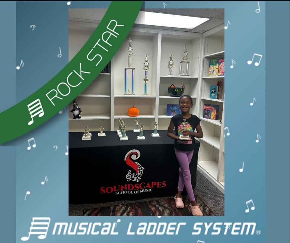 Marley earned her certificate, wristband, and trophy for 1 year!