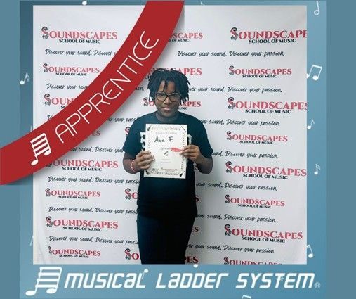 Ava earned her certificate and wristband for 3 months of piano lessons!