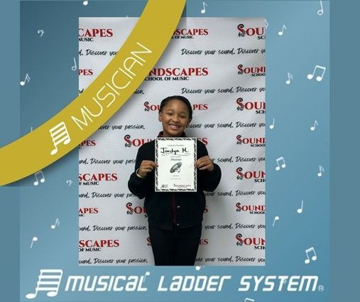 Jordyn earned her certificate and wristband for 9 months of piano lessons!