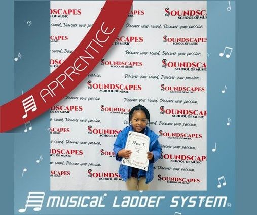 Nova earned her certificate and wristband for 3 months of violin lessons!