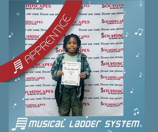 Prince-Isaac earned his certificate and wristband for 3 months of piano lessons!