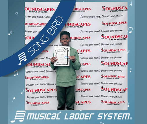 Warren earned his certificate, wristband, and trophy for 6 months of piano lessons!