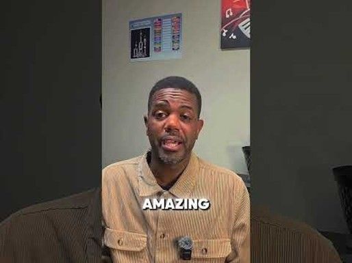 Man in tan shirt speaking, 