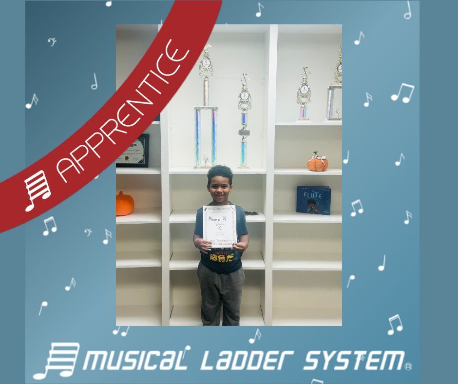 Moses earned his certificate and wristband for 3 months of piano lessons!
