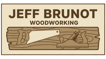 Logo for Jeff Brunot Woodworking with text, saw, and plane on a wooden plank.