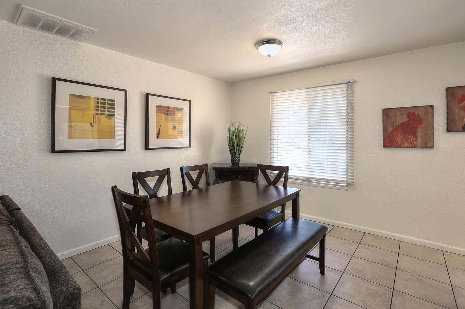 Dining Room A dining room with a table and chairs and a bench