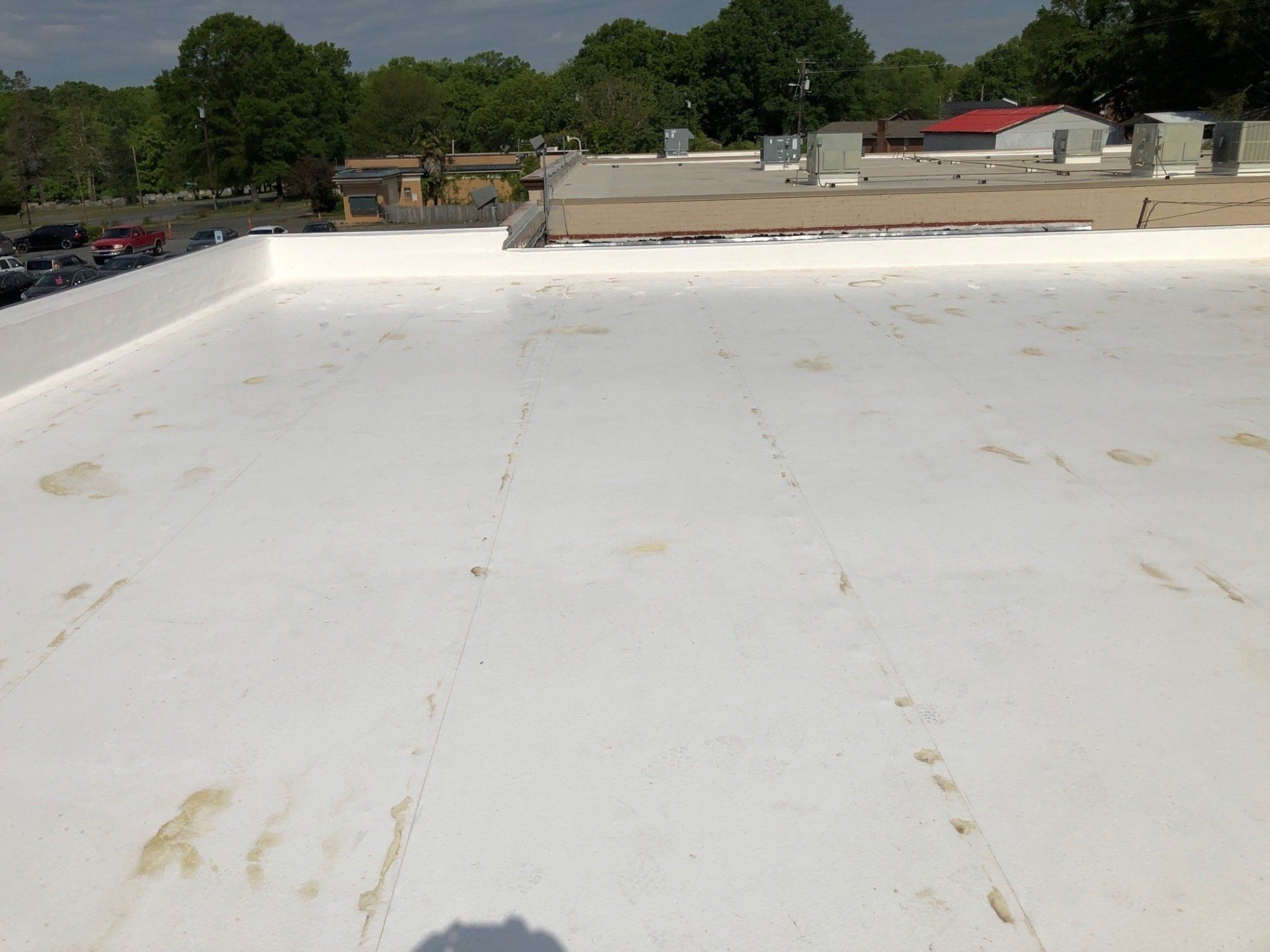 Flat Roof With Stains — New Window in Concord, NC