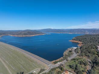 A drone view of Oroville Dam and Lake Oroville in Butte County, California. On this date, the water storage at Lake Oroville was 2,707,699 acre-feet (AF), 77 percent of the total capacity. Photo taken January 30, 2024.