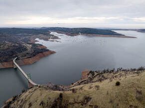 A drone view of water levels at Bidwell Bar Bridge and (Left) Bidwell Canyon Marina at Lake Oroville in Butte County, California.  On this date, the water storage was 2,008,215 acre-feet (AF), 59 percent of the total capacity. Photo taken December 20, 2024.