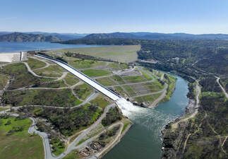 A drone view of Oroville Dam and main spillway at Lake Oroville in Butte County, California. Photo taken March 11, 2025.   On this date, the water storage was 2,881,527 acre-feet (AF), 84 percent of the total capacity. 