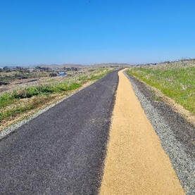 A section of the Brad Freeman trail near Cherokee Road features an 8-foot-wide asphalt path and a newly installed 4-foot-wide decomposed granite pedestrian path. Picture