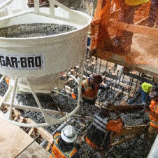 California Department of Water Resources contractors pour concrete over rebar during improvements to Oroville Dam's River Valve Outlet System (RVOS).