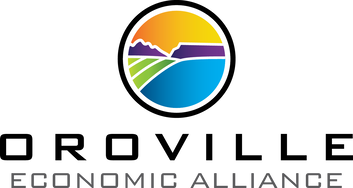 The oroville economic alliance logo is a colorful circle with a mountain in the middle.