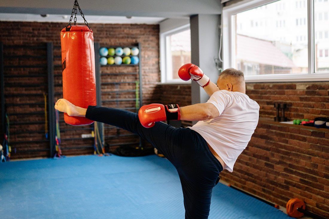 Man Kicked the Punching Bag — MoneySmith Group In Kingscliff, NSW