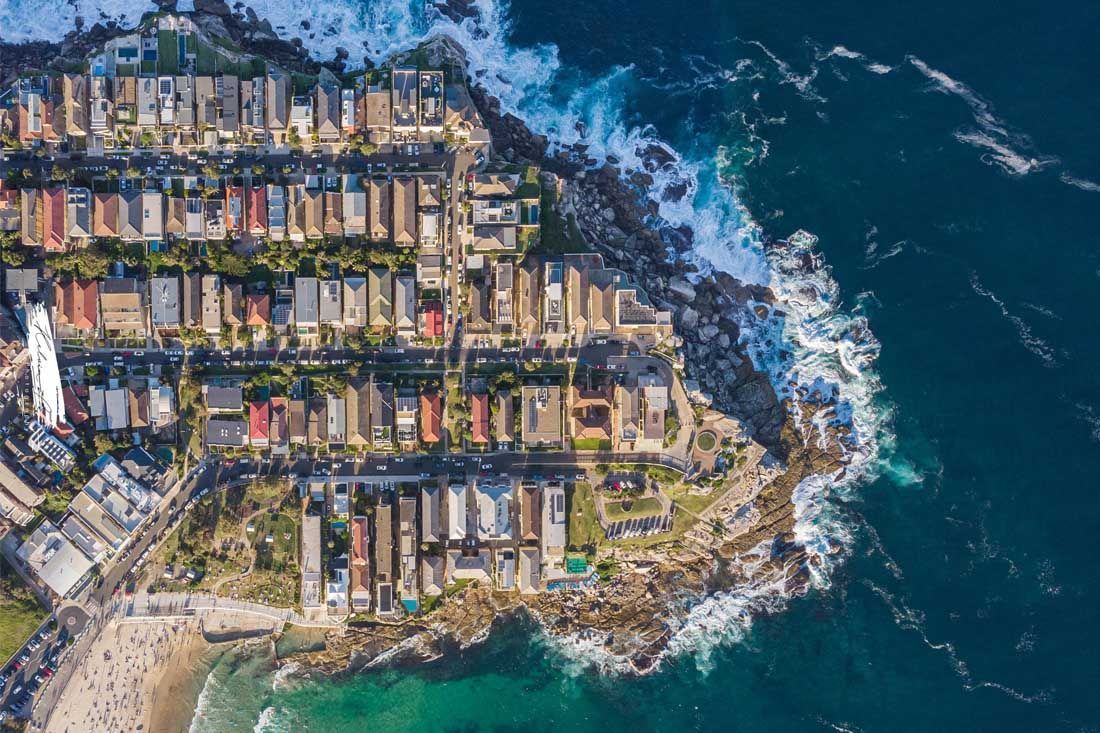 An Aerial View of a Residential Area Next to the Ocean — MoneySmith Group In Kingscliff, NSW