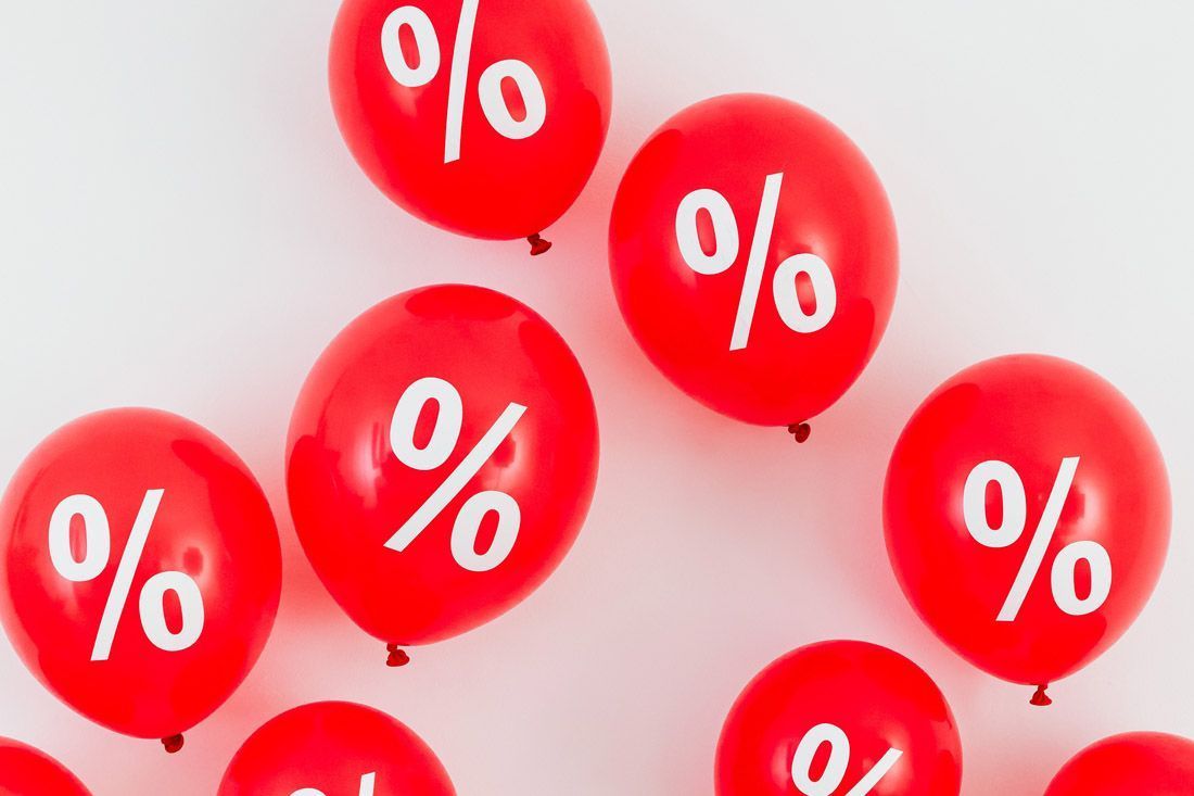 A Bunch of Red Balloons With Percent Symbols on Them — MoneySmith Group In Kingscliff, NSW