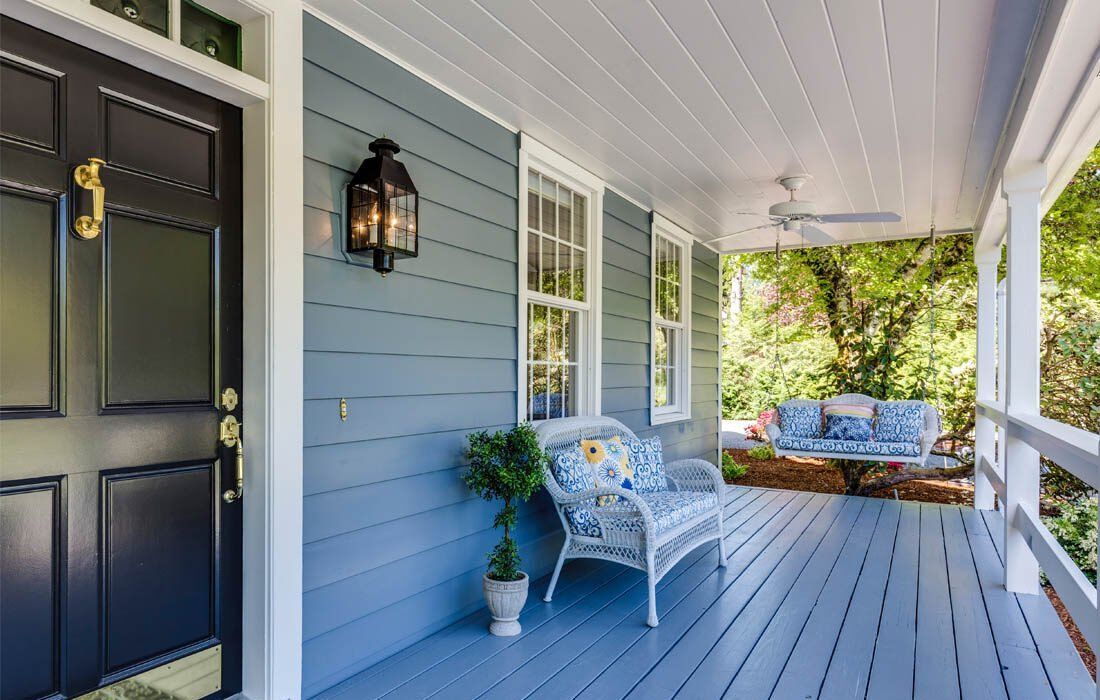 There is a Porch With a Swing and a Couch on It — MoneySmith Group In Kingscliff, NSW