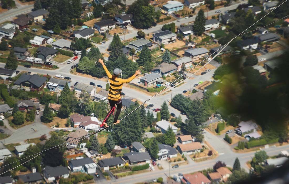 Person is Flying Through the Air Over a Residential Area — MoneySmith Group In Kingscliff, NSW