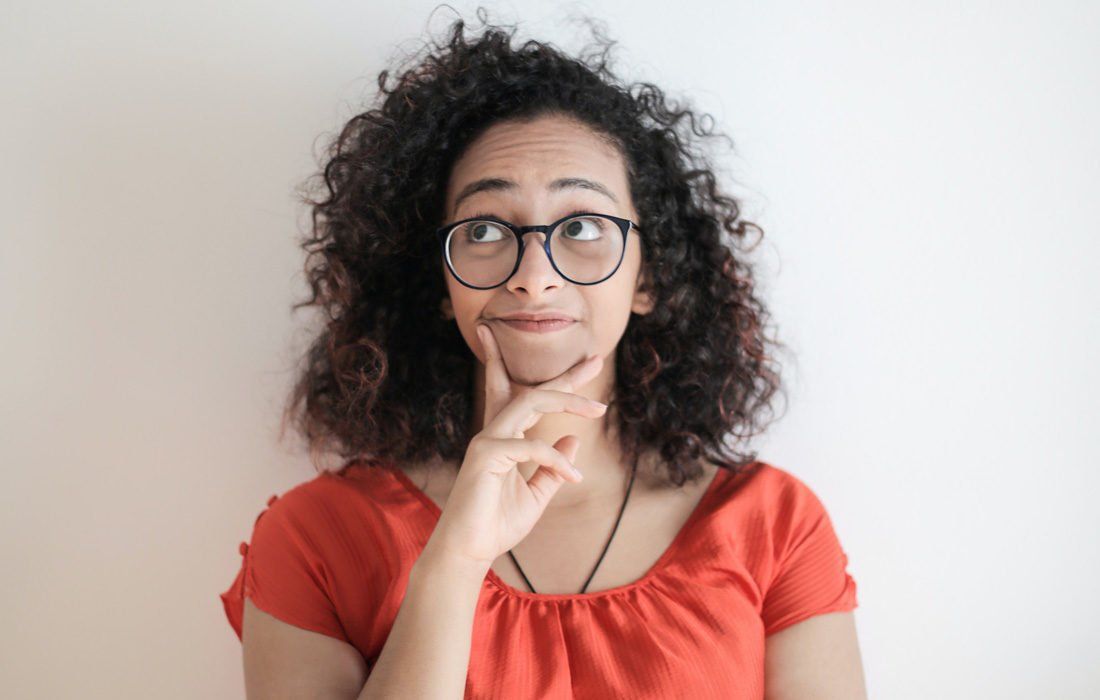 A Woman Wearing Glasses — MoneySmith Group In Kingscliff, NSW