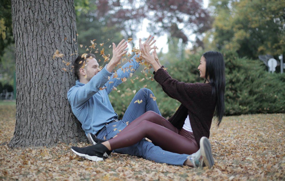 A Man and a Woman Are Sitting Under a Tree — MoneySmith Group In Kingscliff, NSW