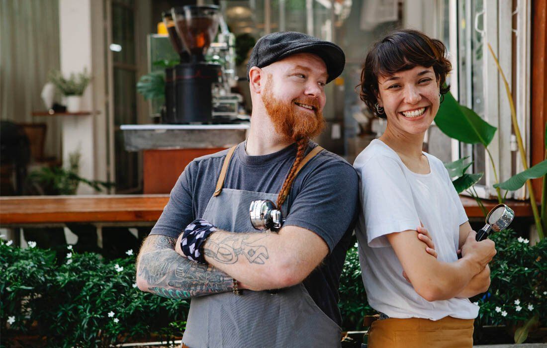 Man and a Woman in the Restaurant — MoneySmith Group In Kingscliff, NSW