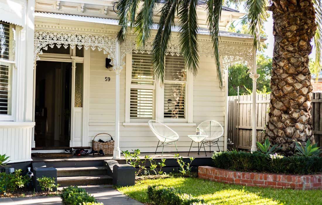 White House With a Palm Tree in Front of It — MoneySmith Group In Kingscliff, NSW