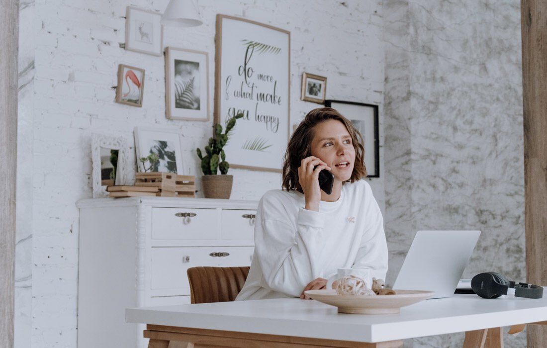 A Woman is Talking on a Cell Phone — MoneySmith Group In Kingscliff, NSW