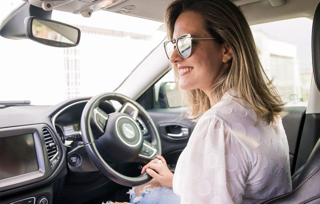 Woman in a Car — MoneySmith Group In Kingscliff, NSW