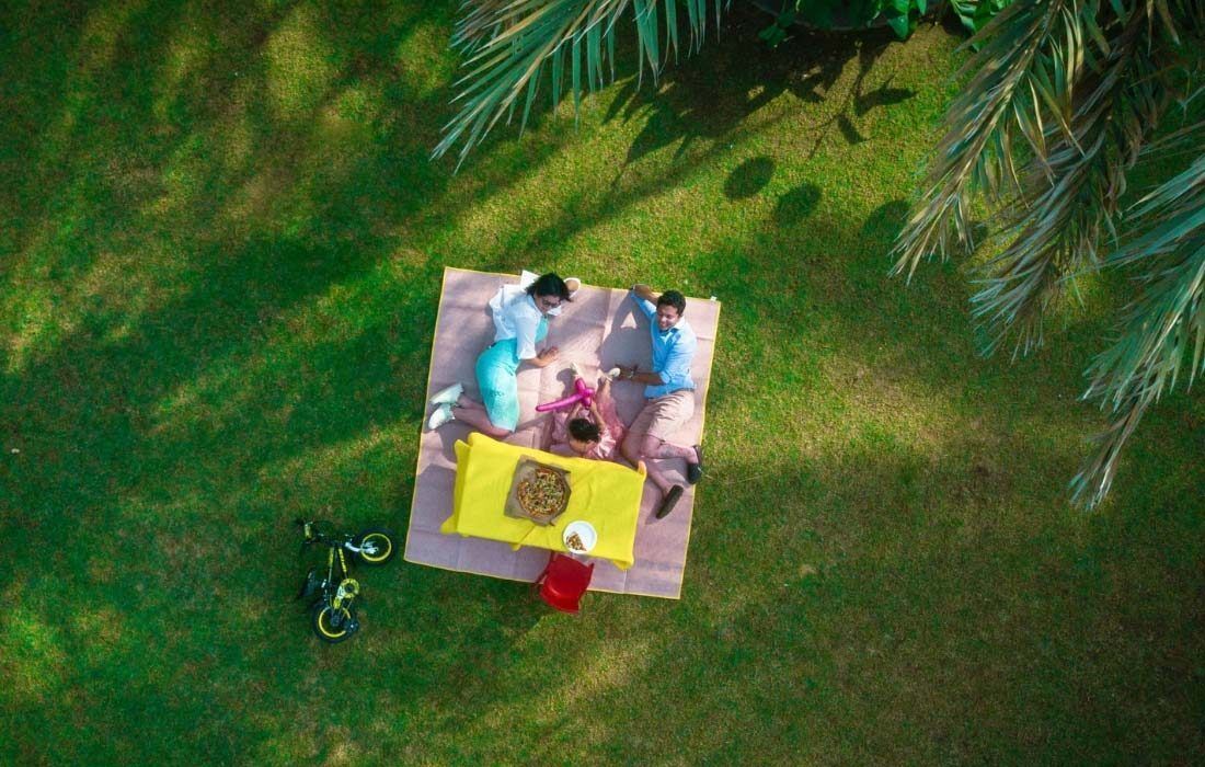 Aerial View of a Group of People Laying on a Blanket — MoneySmith Group In Kingscliff, NSW