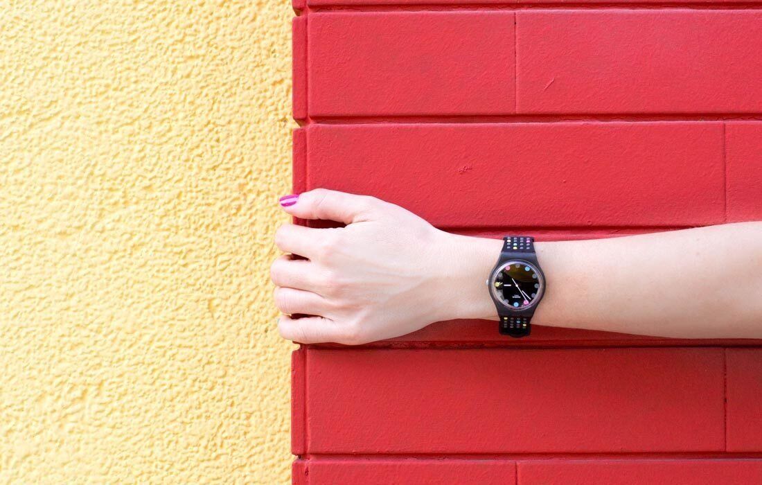 A Woman is Wearing a Black Watch — MoneySmith Group In Kingscliff, NSW
