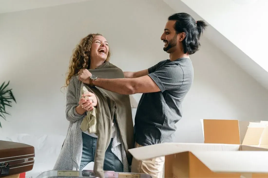 A Man and a Woman in a Living Room — MoneySmith Group In Kingscliff, NSW