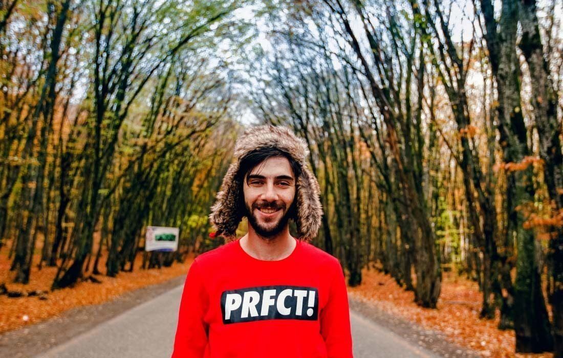 A Man Wearing a Red Sweater — MoneySmith Group In Kingscliff, NSW
