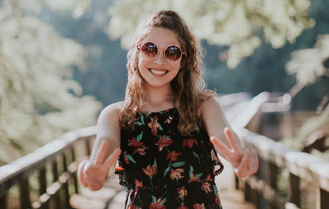 A Woman Wearing Sunglasses — MoneySmith Group In Kingscliff, NSW
