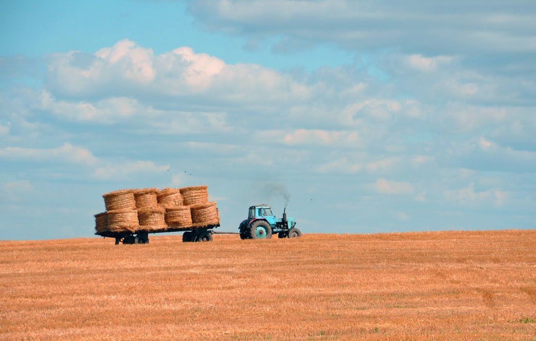 A Tractor is Pulling a Trailer — MoneySmith Group In Kingscliff, NSW