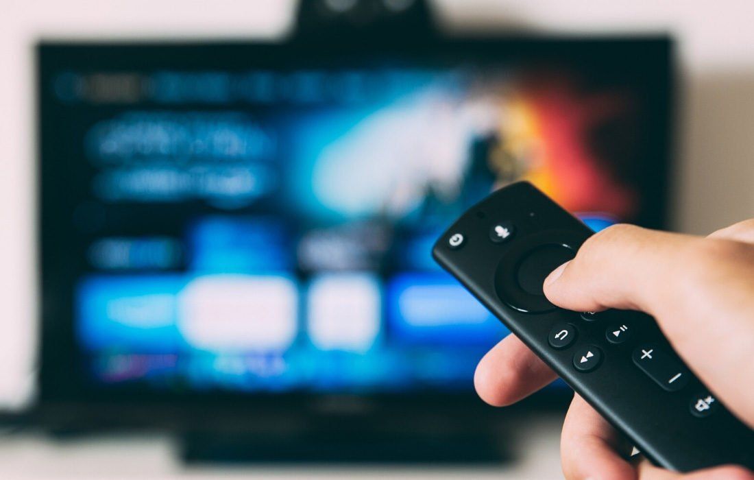 A Person is Holding a Remote Control — MoneySmith Group In Kingscliff, NSW