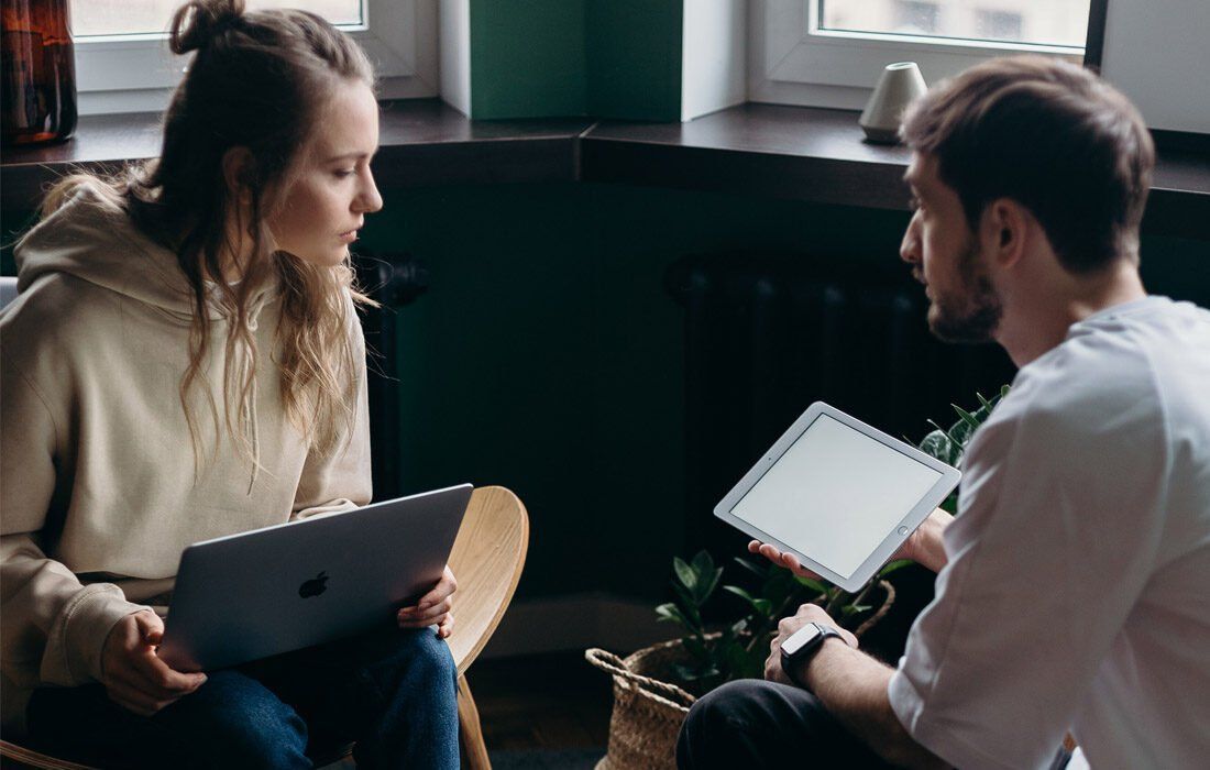 A Man and a Woman Are Discussing — MoneySmith Group In Kingscliff, NSW