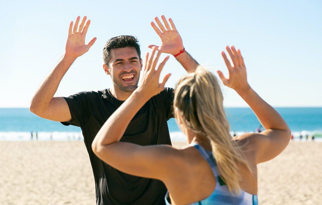 Man and a Woman Are Giving Each Other a High Five — MoneySmith Group In Kingscliff, NSW