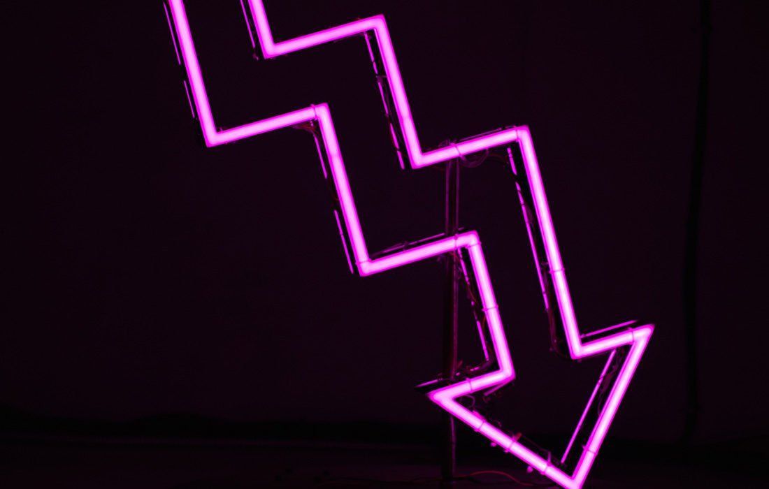 A Neon Arrow Pointing Down — MoneySmith Group In Kingscliff, NSW