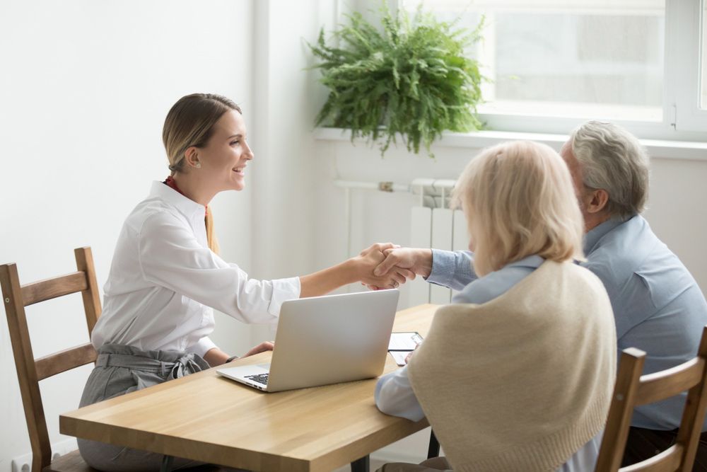 Mortgage Broker Speaking to A Couple