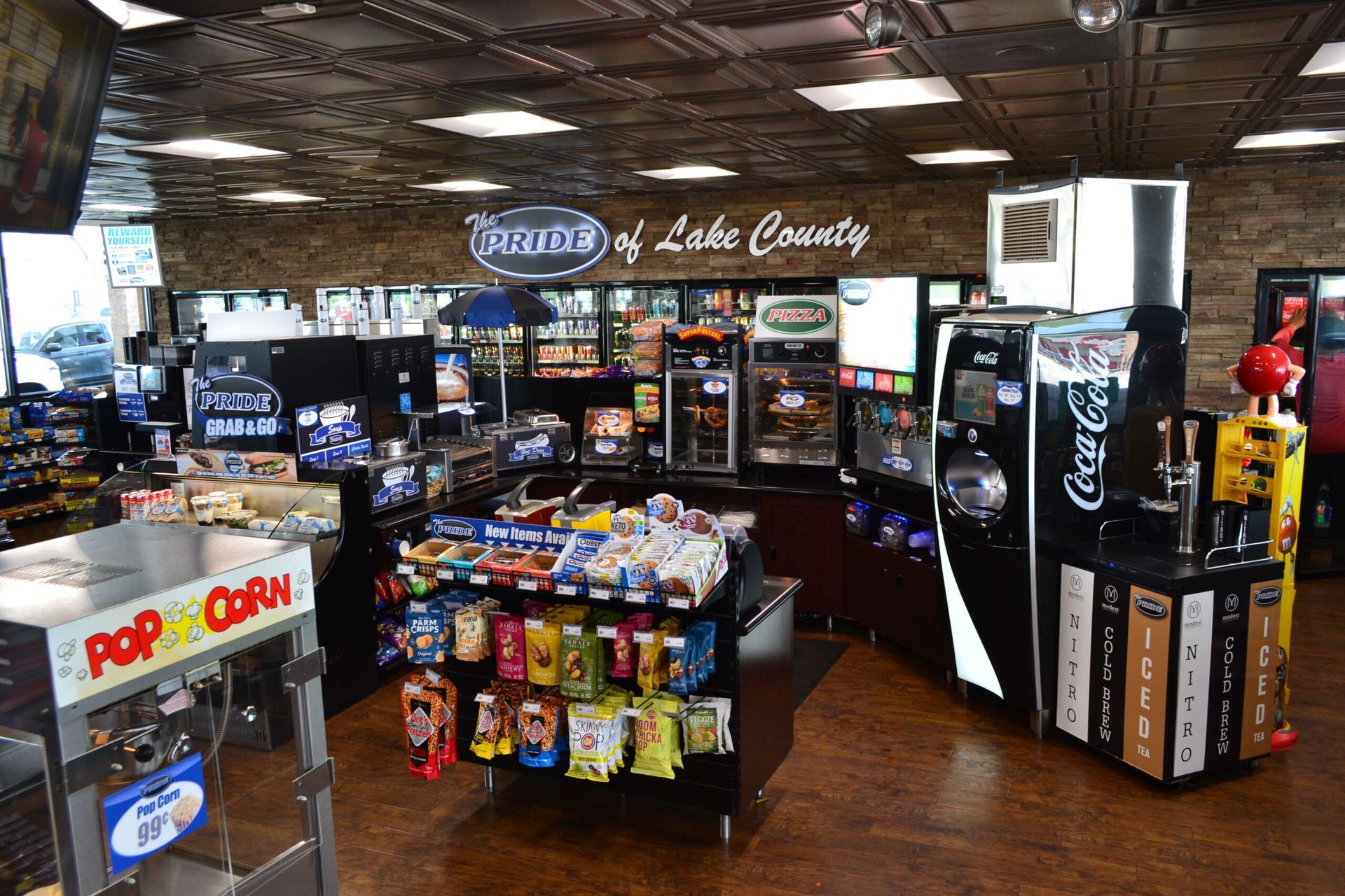 There is a popcorn machine in the middle of the room.