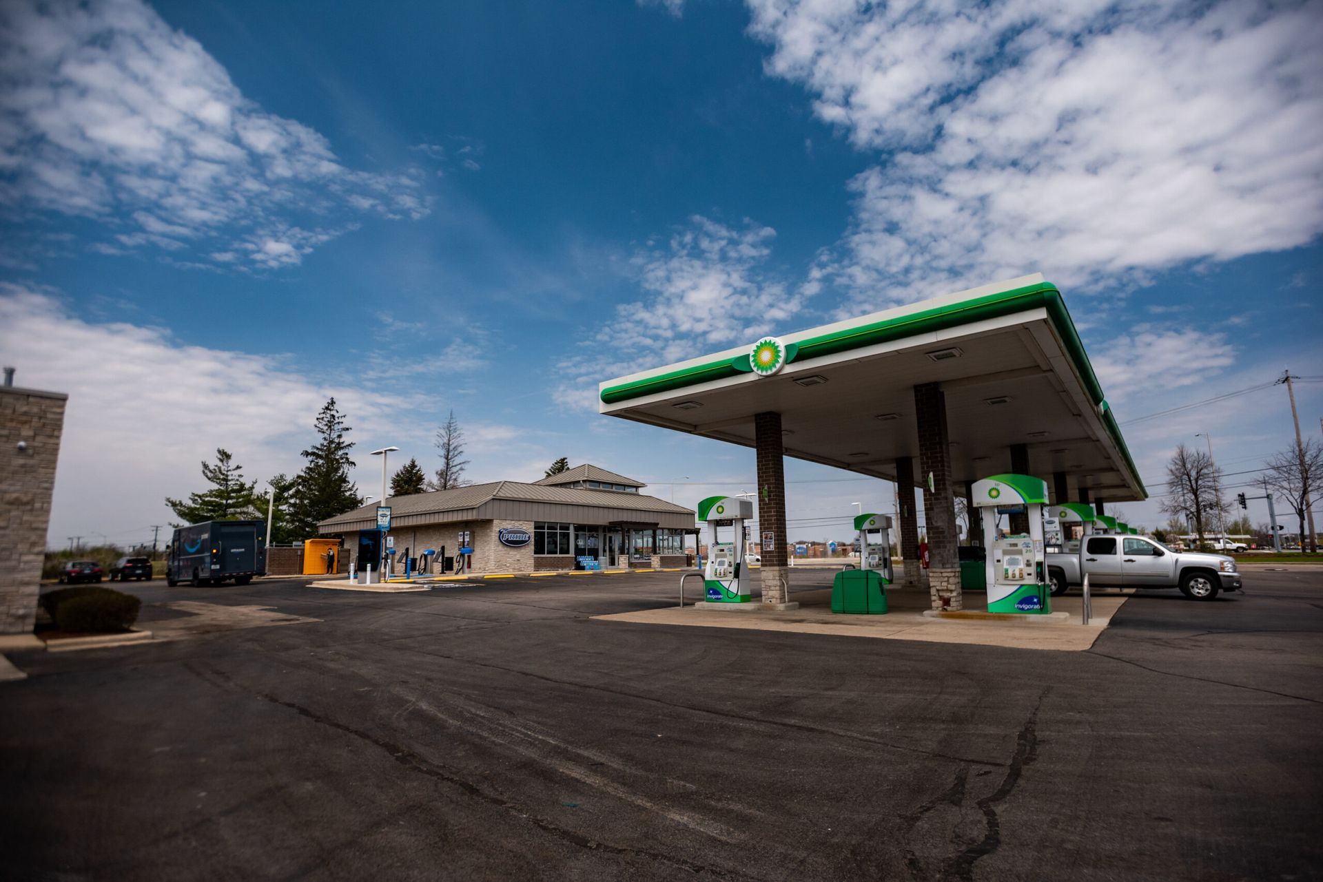 A bp gas station with a blue sky in the background